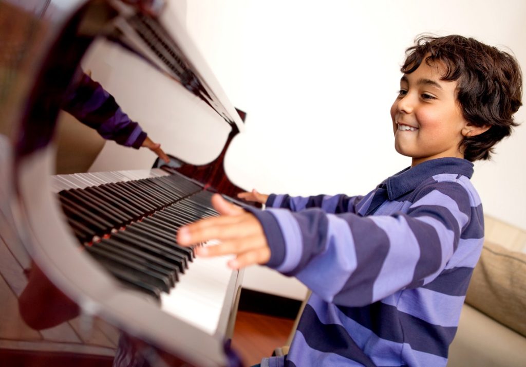 a child playing piano