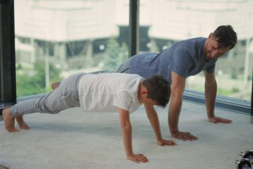dad and son doing push ups