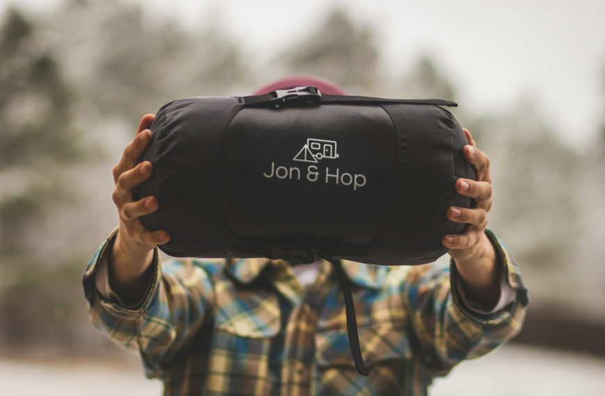 person holding Jon & Hop bag